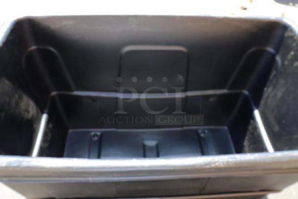 Brand new Lavex 12 cu ft black cube truck, model 475CT12400BK, 600 lb capacity. Dimensions: 44"x28"x28". Front wheels need adjustment.