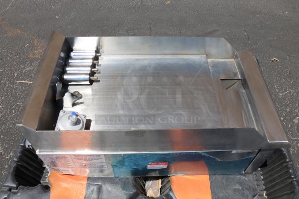 Brand new Avantco CAG-15-MG 15" countertop gas griddle, stainless steel, manual controls, 30,000 BTU. Serial: 679049000007.