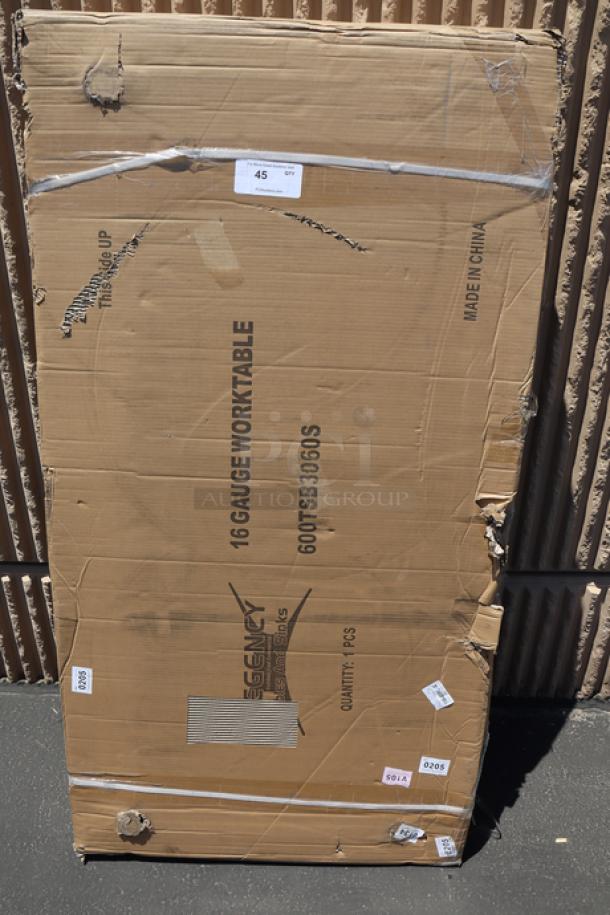 Regency 600TSB3060S stainless steel work table in original packaging, 30"x60", 16-gauge, with 4" backsplash, scratch-n-dent.