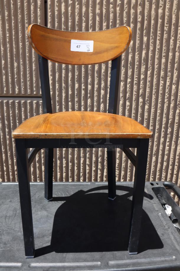 Lancaster Table & Seating Boomerang Chair, black finish, antique walnut seat/backs, slight scratches, no packaging.
