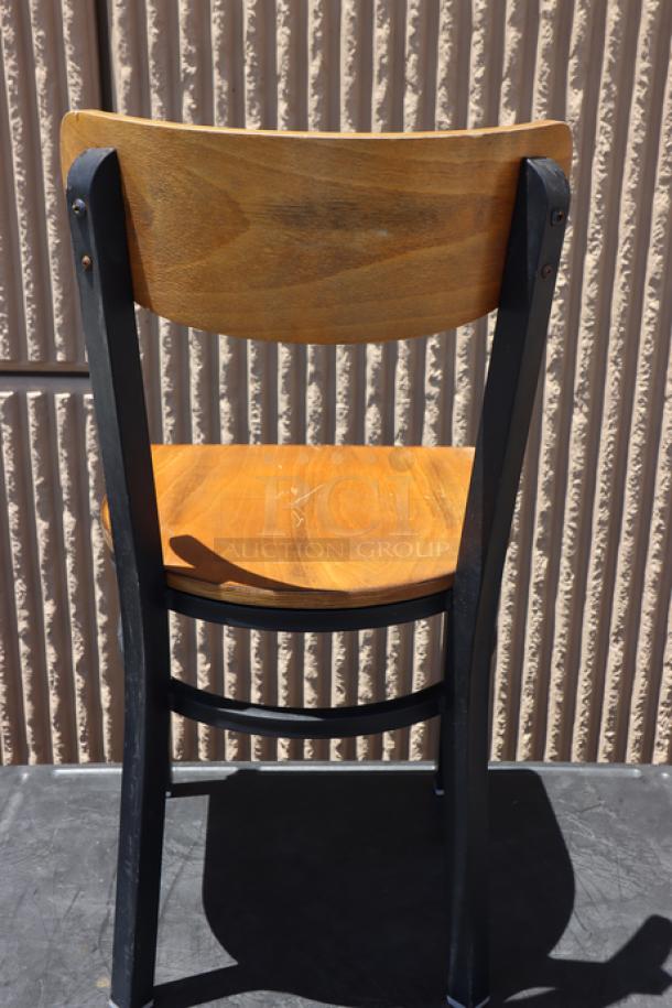 Brand new Lancaster chair with black finish, antique walnut wood seat, minor scratches, vintage style, sturdy build.