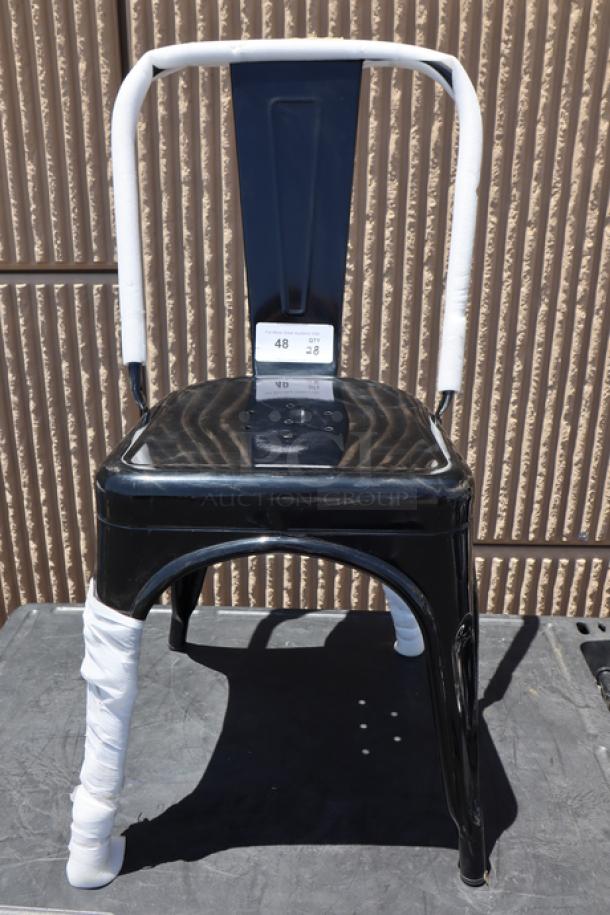 Lancaster Table & Seating Alloy Onyx Black Outdoor Cafe Chair, model 164CMCAFEBLK. New, slight scuffs/scratches.