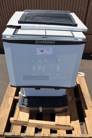 BRAND NEW SCRATCH-N-DENT! Scotsman HID525A-1 Meridian® Countertop Air Cooled Ice Machine and Water Dispenser - 25 lb. Bin Storage. 115 Volts	9 Amps	1 Phase. S/N: 24111320011237 Metal cover panels are dented/bent...Doesn't appear to be any damage to the actual unit. - Item #1196619