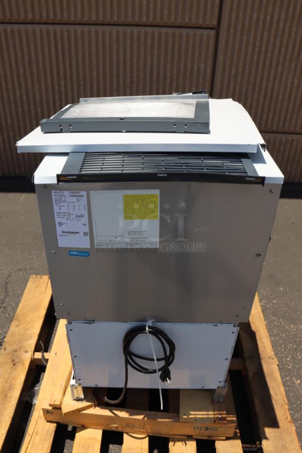Scotsman HID525A-1 ice machine, new scratch-n-dent, metal panels dented; 25 lb. bin storage, 115V, 9A, 1 phase.