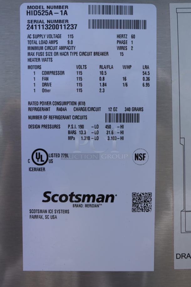 Scotsman HID525A-1 Meridian® countertop ice machine label, model and serial number shown. Metal panels dented.