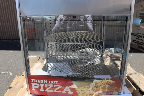Brand new ServIt PDW18D1P 18" pizza warmer with rotating 4-shelf rack, pretzel rack. No glass damage, some dents. 120V, 1,500W.