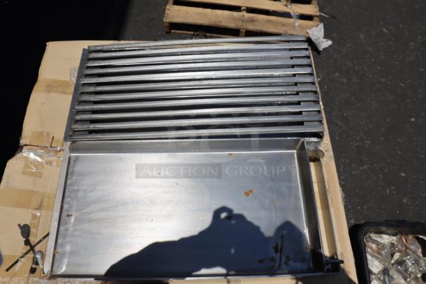 Brand new Avantco 177AOGB2427 4-burner griddle/broiler top, 24"x27"x4", stainless steel, unpackaged but unused.