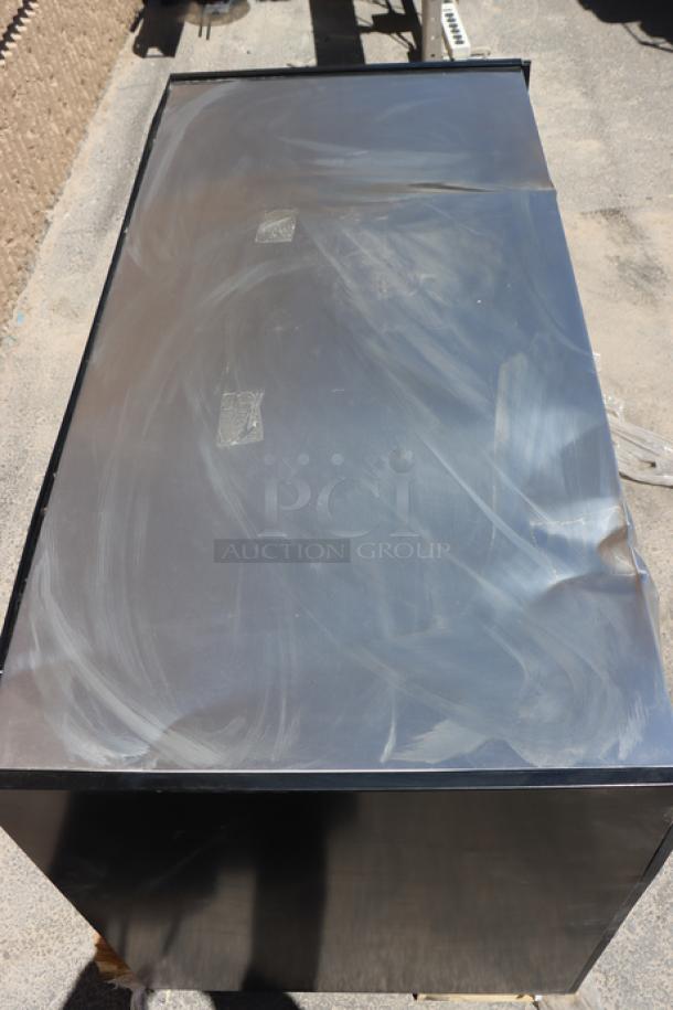 Brand new All State Manufacturing OCS490 TR SF coffee stand, 49" x 23.25" x 34", with visible surface scratches.
