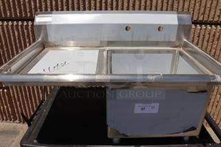 Brand new Steelton 522CS11818LT stainless steel commercial sink with left drainboard. Features minor dents and scratches.
