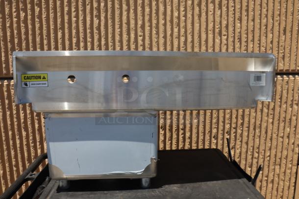 BRAND NEW Steelton 522CS11818LT commercial sink, 18-gauge stainless, left drainboard, minor dents/scratches, caution label.
