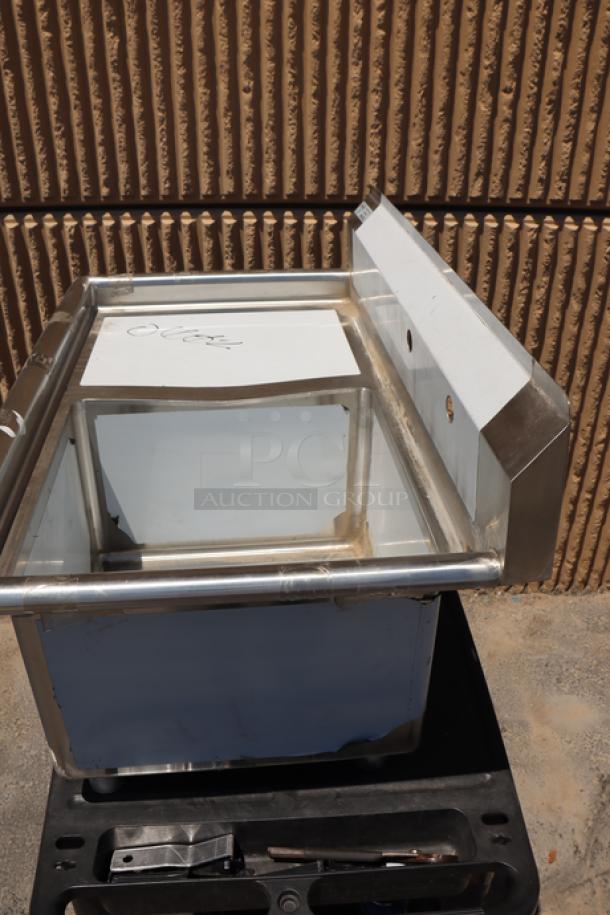 Steelton 522CS11818LT stainless steel commercial sink, 18-gauge, one compartment, left drainboard, minor dents and scratches.