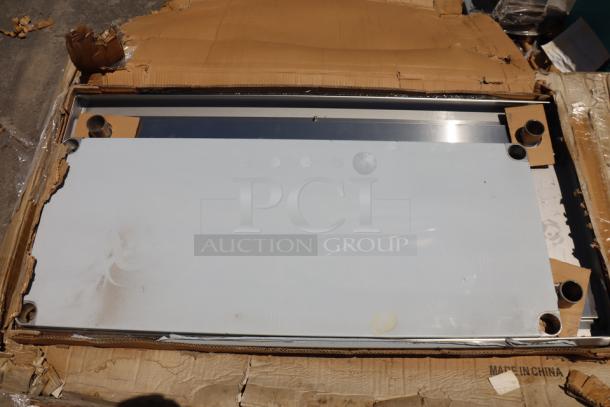 Regency 600TS2448S 24" x 48" stainless steel work table with undershelf, new, scratch-n-dent condition, in packaging.