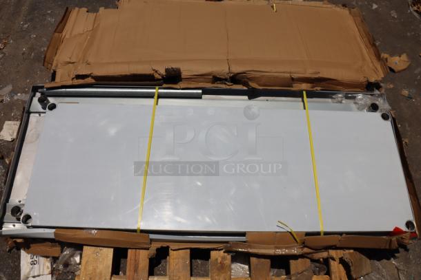 BRAND NEW Regency 600T3072G 30"x72" stainless steel work table, 18-gauge 304, with galvanized legs and undershelf, in box.