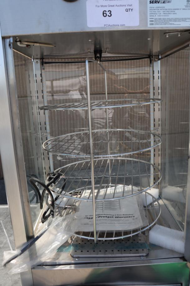 Brand new ServIt PDW12D1 12" pizza warmer, full-service, 4-shelf rotating rack, intact glass, minor denting, 120V, 800W.