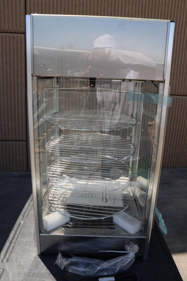 ServIt PDW12D1 12" Pizza Warmer with 4-shelf rotating rack, 800W, all glass intact, minor denting, includes all parts.