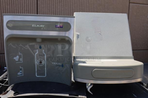 Brand new Zurn Elkay EZSDWSLK ezH20 hands-free bottle filling station with drinking fountain, light gray, non-filtered, non-refrigerated, slight scratches, and dents visible.