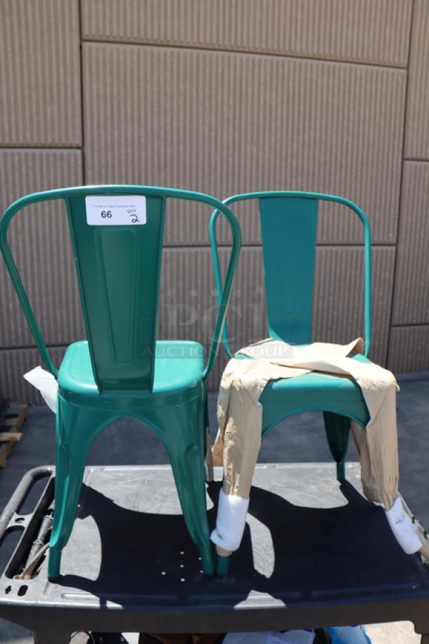 Brand new Lancaster Table & Seating turquoise outdoor cafe chairs, model 164CMCAFEARC, two chairs out of original packaging.