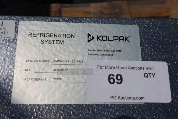 Kol-Pak AM46-141-1EC-PR-8 evaporator, 115V, 1A, with minor denting and damaged fan covers. Refrigerant R448A, model details visible.