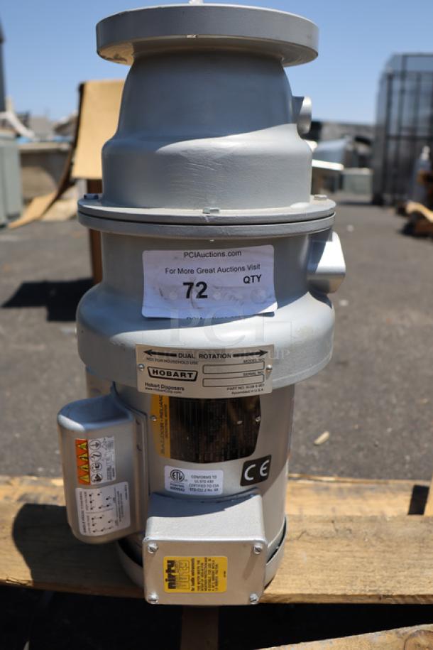Brand new Hobart FD4/75-3 commercial garbage disposer, 3/4 hp, 120/208-240V, short upper housing, serial number 104010898-TBA.