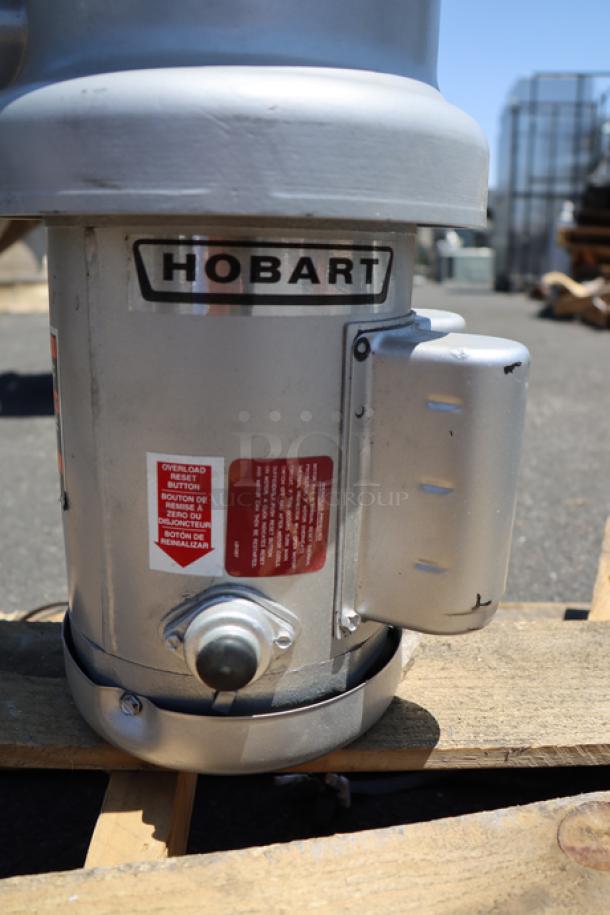 BRAND NEW Hobart FD4/75-3 commercial garbage disposer with short upper housing, 3/4 hp, 120/208-240V. Serial: 104010898-TBA.