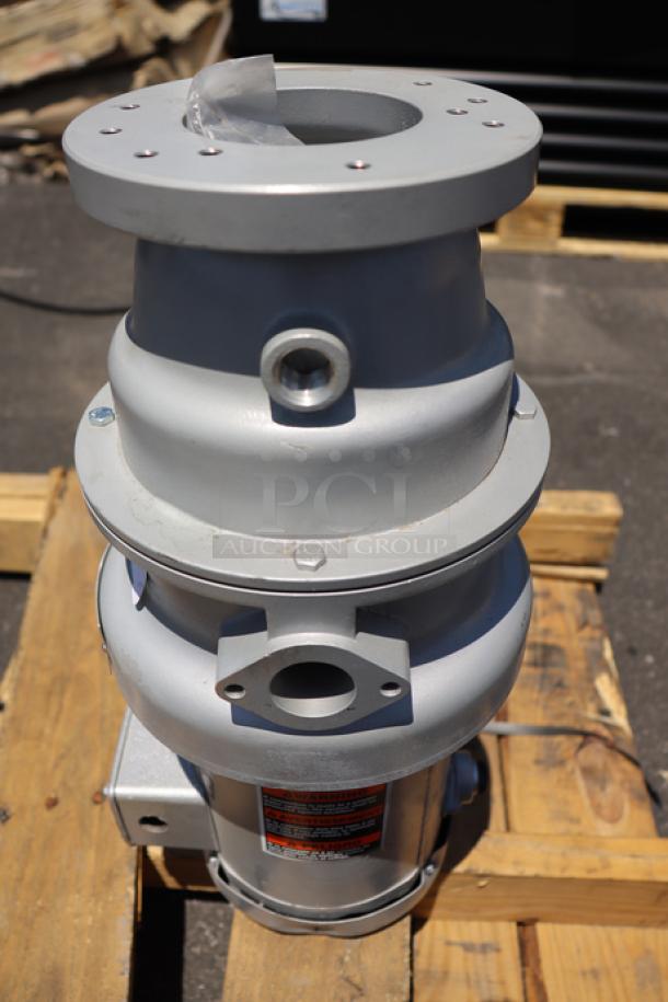 Brand new Hobart FD4/75-3 commercial garbage disposer, 3/4 hp, 120/208-240V, out of packaging. S/N: 104010898-TBA.