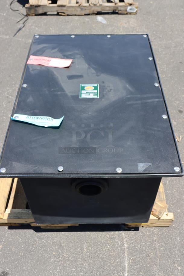 Brand new Ashland PolyTrap 4850 grease trap, 100 lb. capacity, threaded connections, scratch-n-dent condition, with labels.