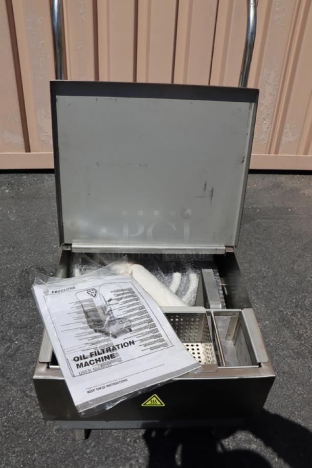 Fryclone 259OFM55 55 lb. portable fryer oil filter machine with open lid, showing interior compartments. Slight food grade oil marks present.
