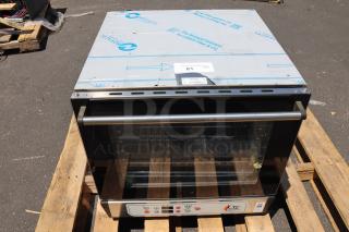 Brand new Cooking Performance Group COH-D4-M half-size convection oven. Scratch-n-dent condition. 4 trays, moisture injection, digital controls. Serial: 00K4618964.