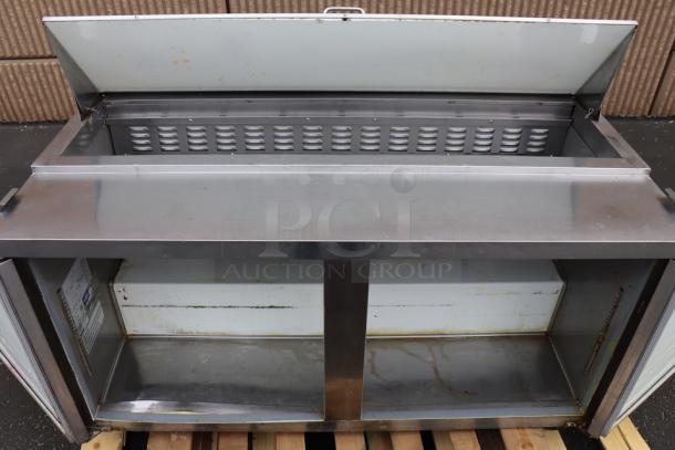 Avantco APT-60-HC 60" refrigerated sandwich prep table, stainless steel, 2 doors open, visible interior, 115V.
