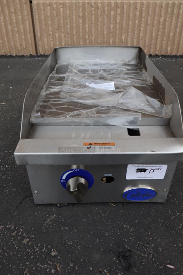 Brand new Globe GG15G countertop gas griddle, 15", 30,000 BTU, stainless steel, slight scratches, serial 16220910660.