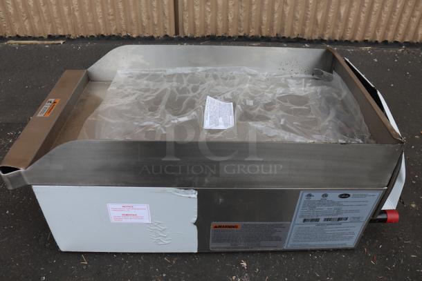 Brand new Globe GG15G 15" gas griddle, 30,000 BTU. Minor scratches, with visible labels and serial number 16220910660.