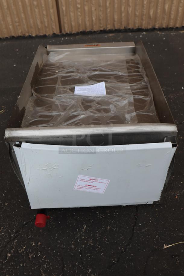 Brand new Globe GG15G 15" countertop gas griddle, 30,000 BTU, with visible scratch and dent. Serial: 16220910660.