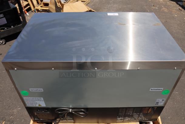 Brand new Avantco SS-UC-48R-HC 48" undercounter refrigerator. Stainless steel exterior with minor scratches. Model: SS-UC-48R-HC, S/N: 427111027.
