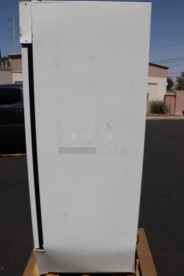 True GDM-26-HC~TSL01 glass door merchandiser, 30" white, LED lighting, brand new scratch-n-dent, bent frame visible.