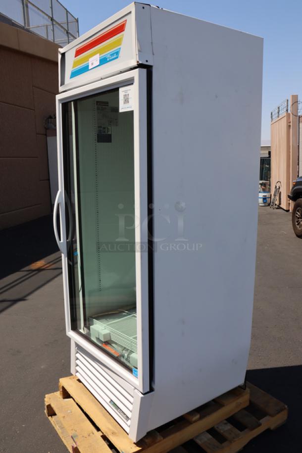 Brand new True GDM-26-HC~TSL01 glass door merchandiser, 30" white, LED lighting, bent frame, displayed on a pallet.