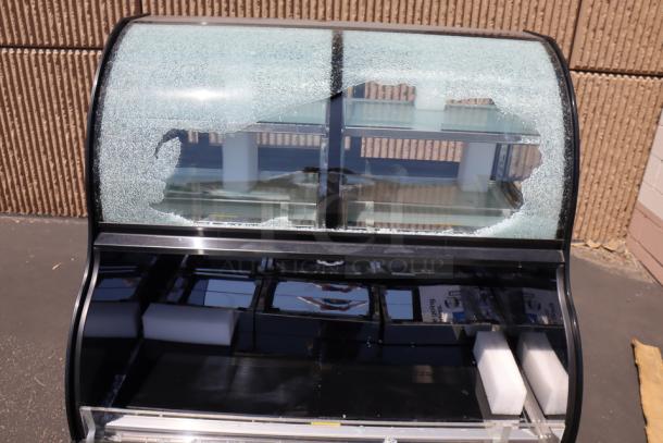 Brand new Avantco CAC-48 refrigerated air curtain merchandiser, black, 47" width. Glass cracked, in working order. Model 193CAC48B.