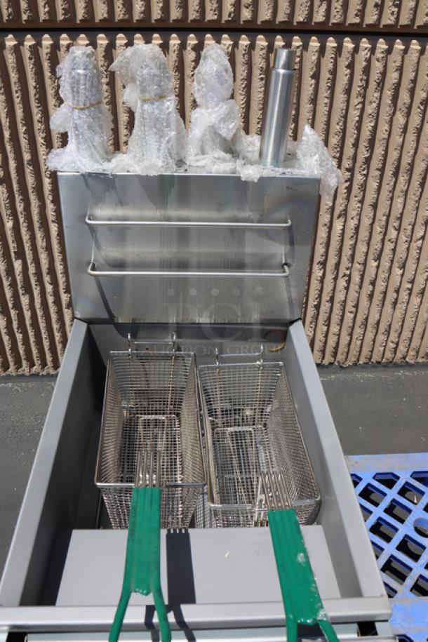 Brand new Avantco EF40-208-3 electric floor fryer, 40 lb capacity, dual baskets, 208V, 3 phase. Serial: 2406043205.