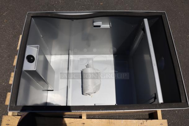 BRAND NEW Regency 600GT25 grease trap, 50 lb. capacity, 25 GPM, 3" non-threaded connections, minor scratches/dents.
