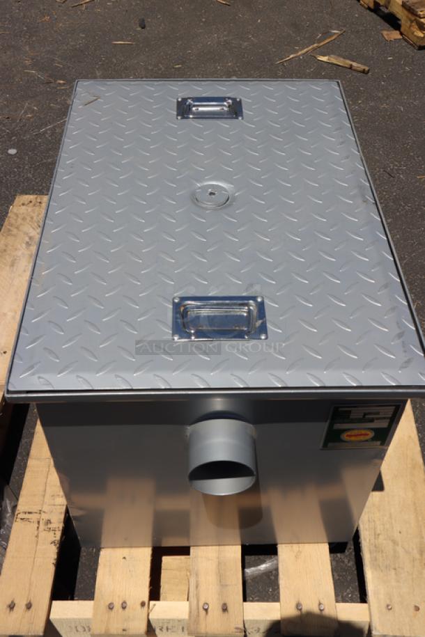BRAND NEW Regency 600GT25 50 lb. grease trap, minor scratches and dents, 25 GPM, non-threaded 3" connections, no packaging.
