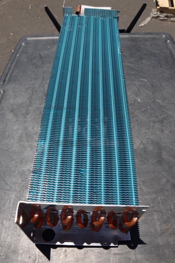Brand new Avantco 17812873HC evaporator coil, scratch-n-dent, out of packaging, visible copper fittings.