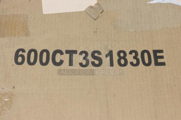 Cardboard packaging with printed model number "600CT3S1830E". Packaging shows signs of damage.