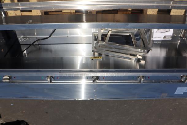Brand new ServIt 423EST5WOPB five pan electric steam table, 208/240V, 3750W. Scratch and dent condition, partially enclosed base.