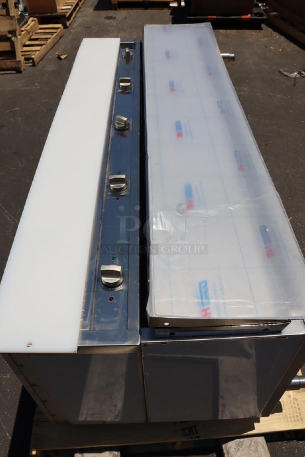 Brand new ServIt 423EST5WOPB steam table, five-pan, electric, partially enclosed base, minor scratches and dents, out of packaging.