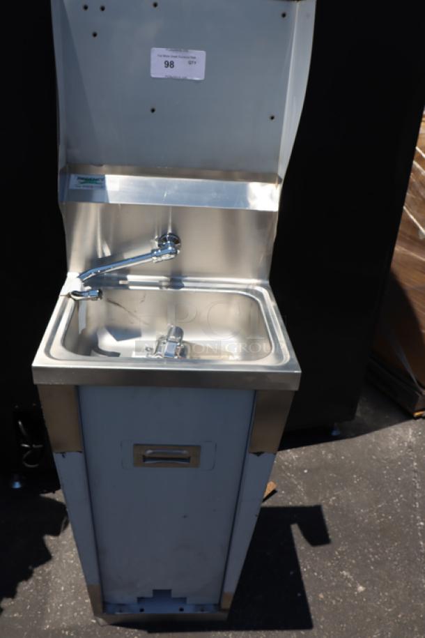Brand new Regency 600HS17FPB hands-free hand sink with pedestal base. Minor scratches visible. Model tag present.