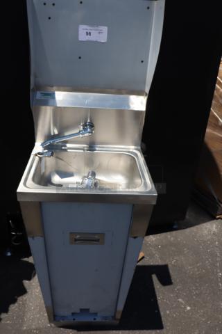 Brand new Regency 600HS17FPB hands-free hand sink with pedestal base. Minor scratches visible. Model tag present.