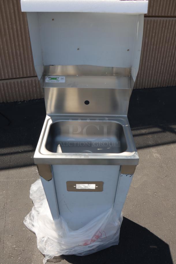 Brand new Regency 600HS17FPB hands-free hand sink with pedestal. Top left corner bent. Stainless steel.
