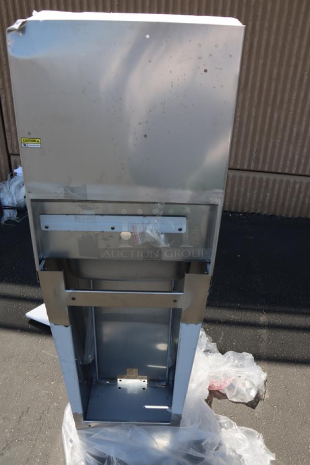 Brand new Regency hands-free hand sink, model 600HS17FPB. Top left corner bent, otherwise unused.