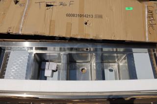 Regency 600B31014213 3 Bowl Underbar Sink, 60" x 18.75", with 2 drainboards. New condition; original packaging damaged.