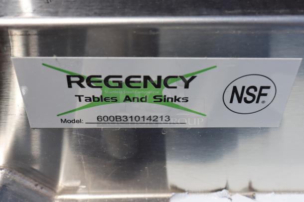 Regency 3 Bowl Underbar Sink model 600B31014213, label shows NSF certification. Original packaging damaged.