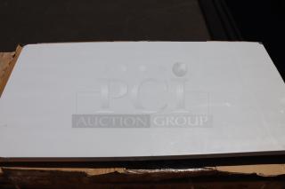 Regency 600T3080G 30" x 30" stainless steel work table, minor scratches and dents, damaged packaging visible.